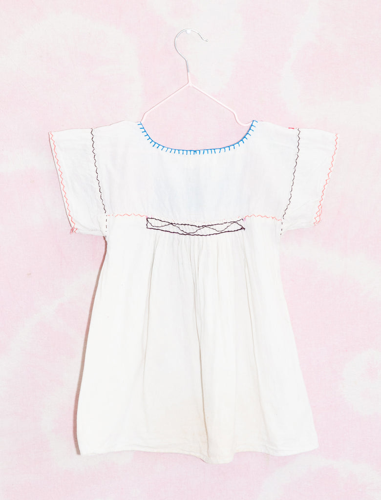 joey rainbow kids vintage natural with rainbow thread Mexican artisan embroidered dress